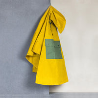 Calton Hill Edinburgh Scotland Collective Matter x Panel Rain Poncho Unisex Katie Schwab with Halley Stevensons and Greenhills Clothing Mary Quant Cumin Racing Green Waxed Cotton