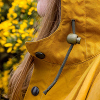 Calton Hill Edinburgh Scotland Collective Matter x Panel Rain Poncho Unisex Katie Schwab with Halley Stevensons and Greenhills Clothing Mary Quant Cumin Racing Green Waxed Cotton